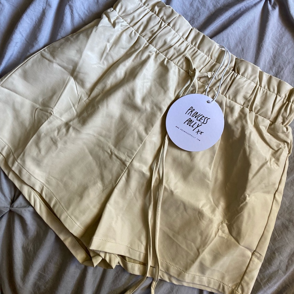 Princess Polly cream shorts